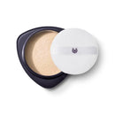 Loose face powder in a dark compact with a white powder puff.