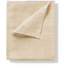 Beige cotton muslin swaddle.