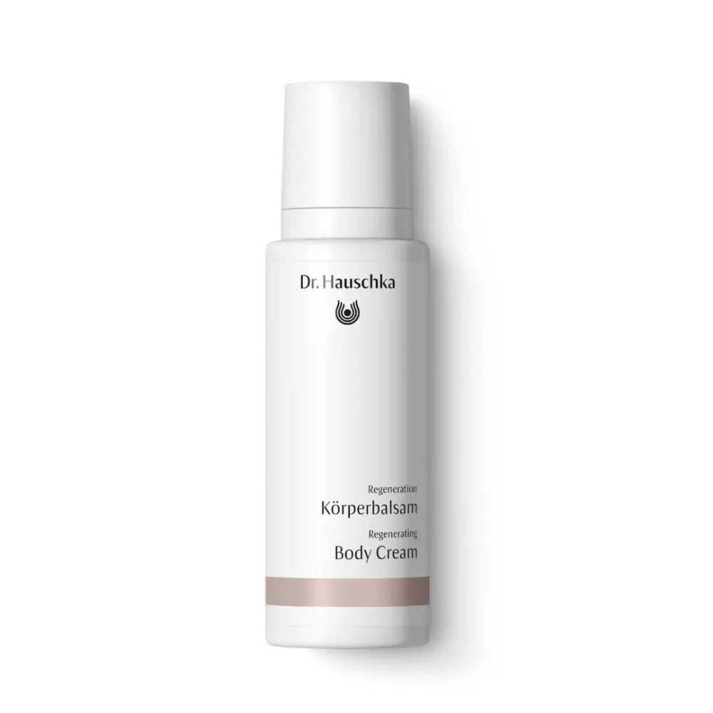 White bottle of Dr. Hauschka body cream with minimal branding.