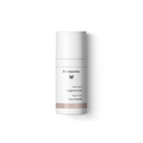White cylindrical bottle of Dr. Hauschka Eye Cream.