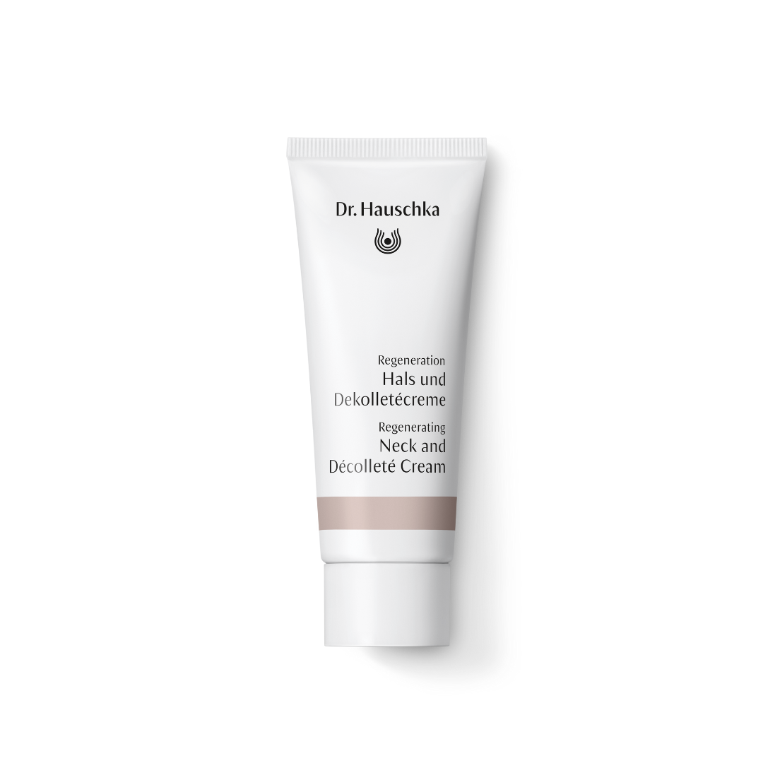 White tube of Dr. Hauschka Neck and Décolleté Cream.