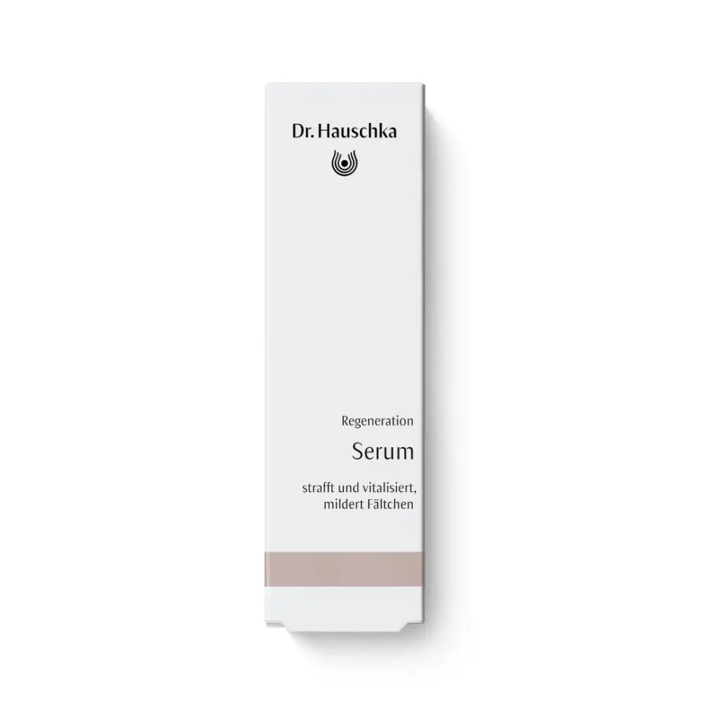 Dr. Hauschka Regeneration Serum in a white and pink retail box.