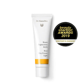 White tube of Dr. Hauschka Rose Day Cream Light.