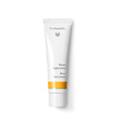 White tube of Dr. Hauschka Rose Day Cream with an orange band on the label.