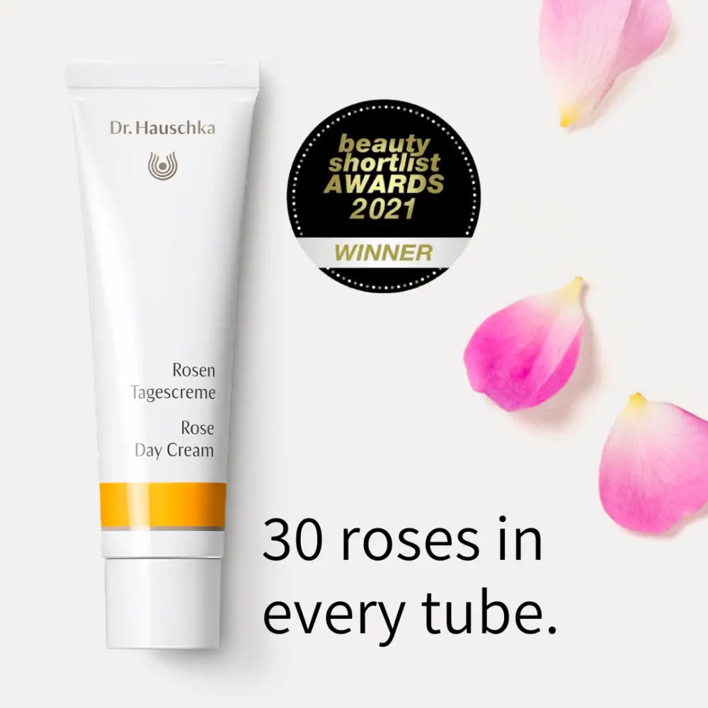 White tube of Dr. Hauschka Rose Day Cream with a beauty award seal.