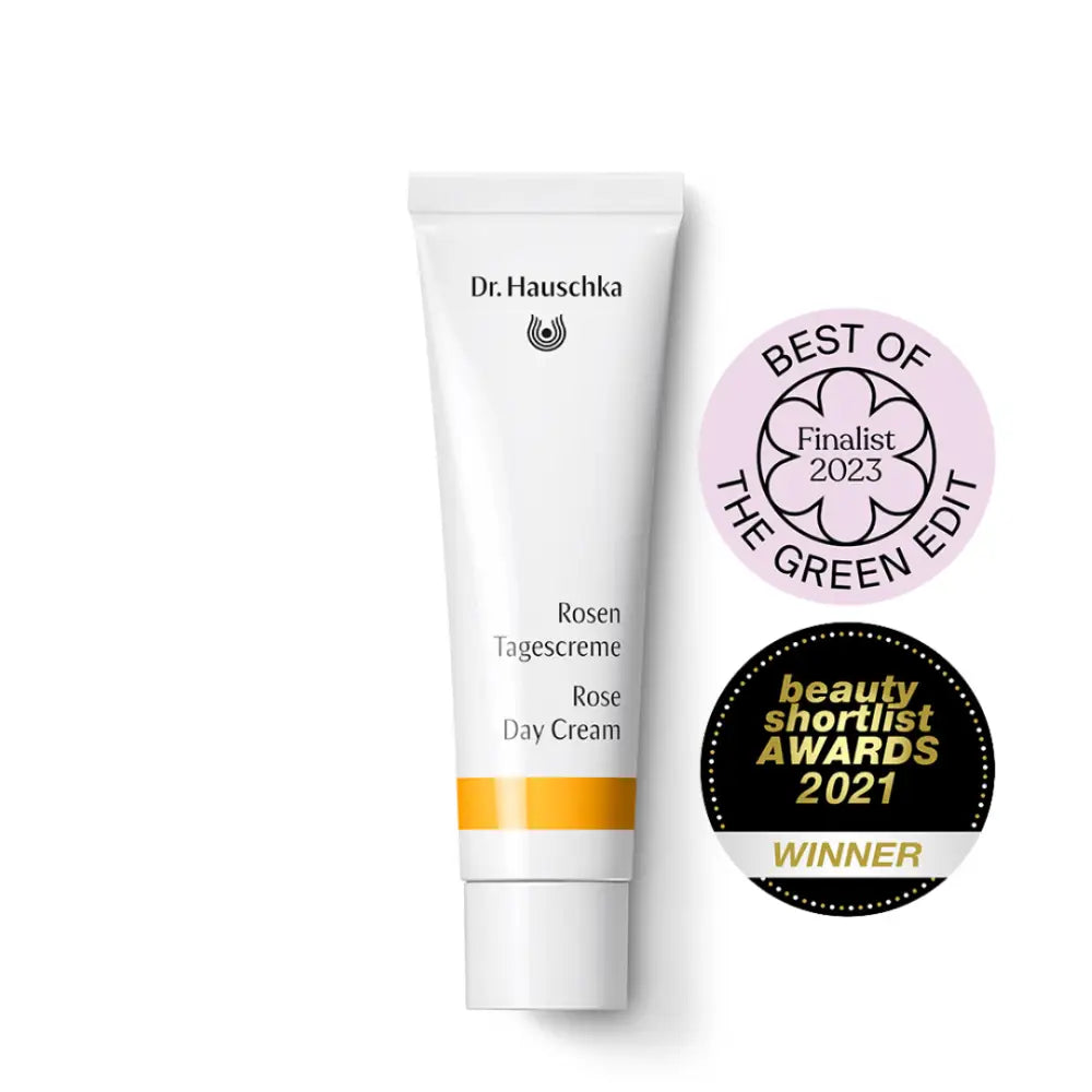 White tube of Dr. Hauschka Rose Day Cream with two award badges.