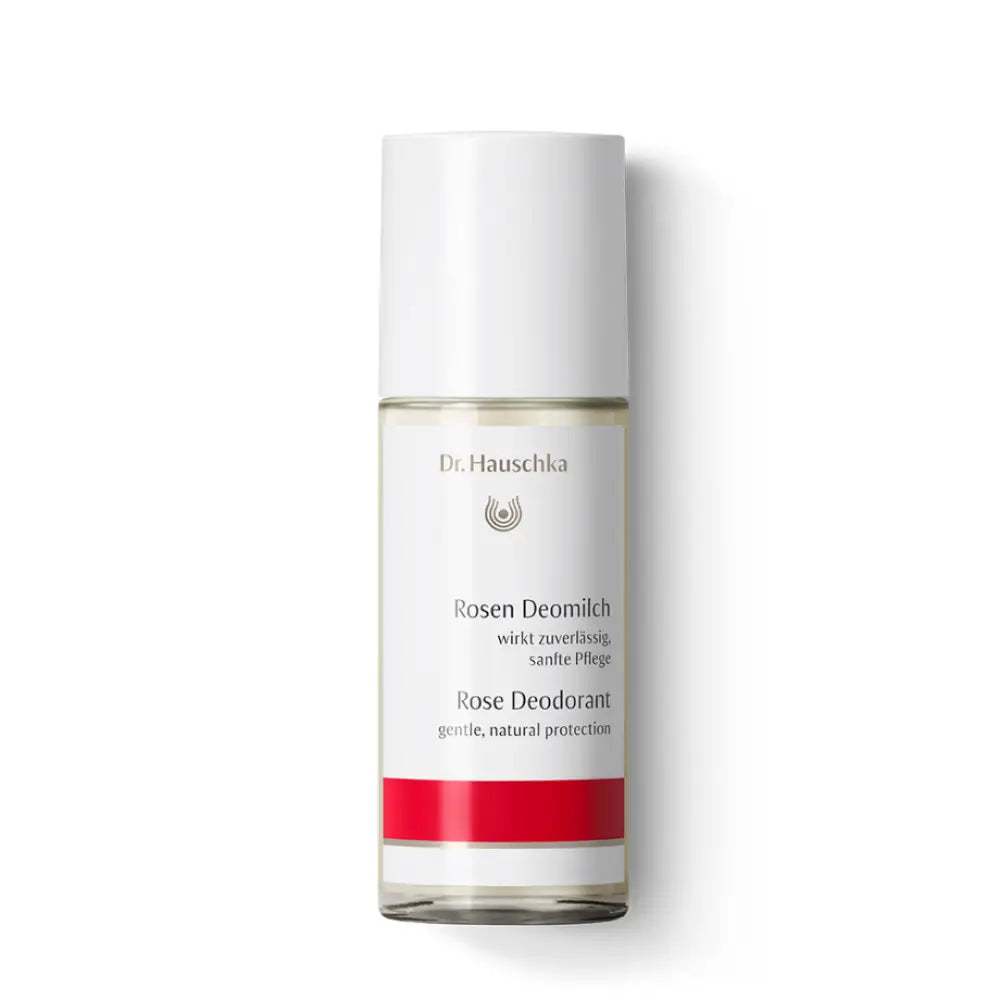 White bottle of Dr. Hauschka Rose Deodorant with a red band near the bottom.