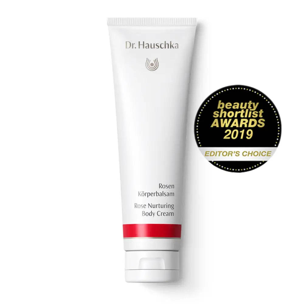 Dr. Hauschka Rose Nurturing Body Cream with a beauty award badge.