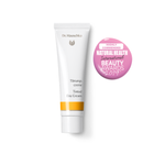 White tube of Dr. Hauschka Tinted Day Cream with a pink award badge.