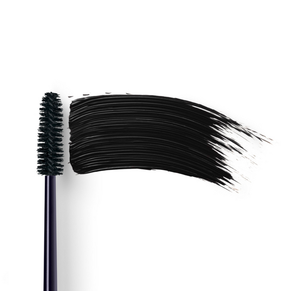Mascara brush with black smear.