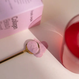 Pink eraser dust on a gold ring or band.