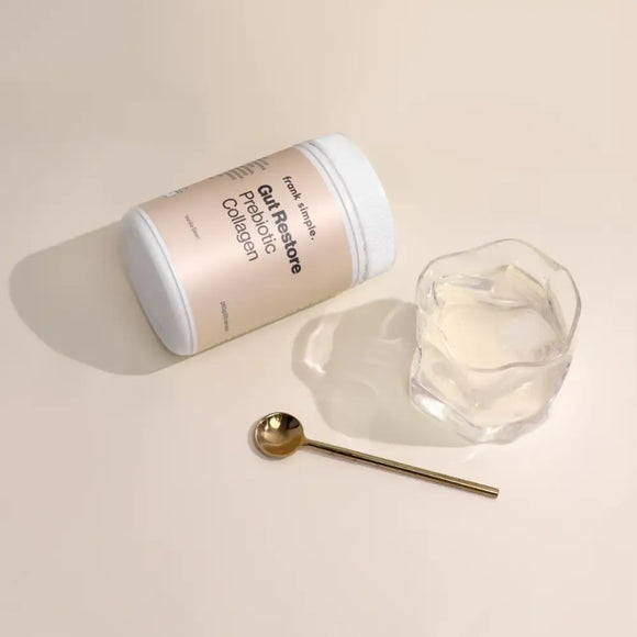 White cylindrical container with text on its label.