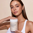 White cylindrical container of Frank Simple Gut Restore Prebiotic Collagen supplement.