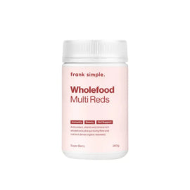 White container of Frank Simple Wholefood Multi Reds supplement powder with pink labeling.