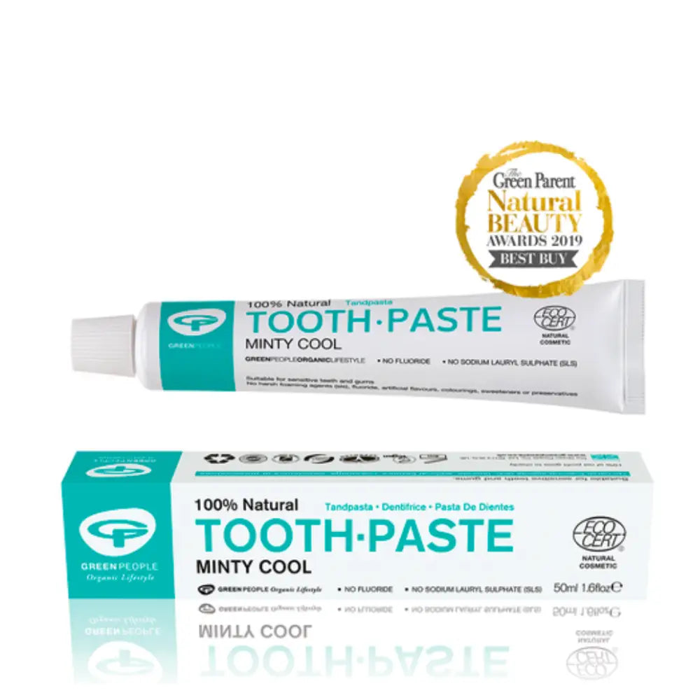 Natural minty cool toothpaste tube and box in turquoise and white colors.