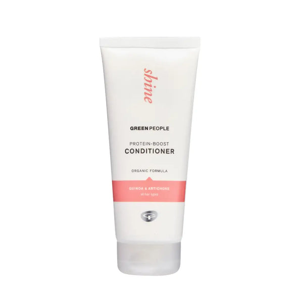 White tube of Green People natural beauty conditioner with coral-pink accents.