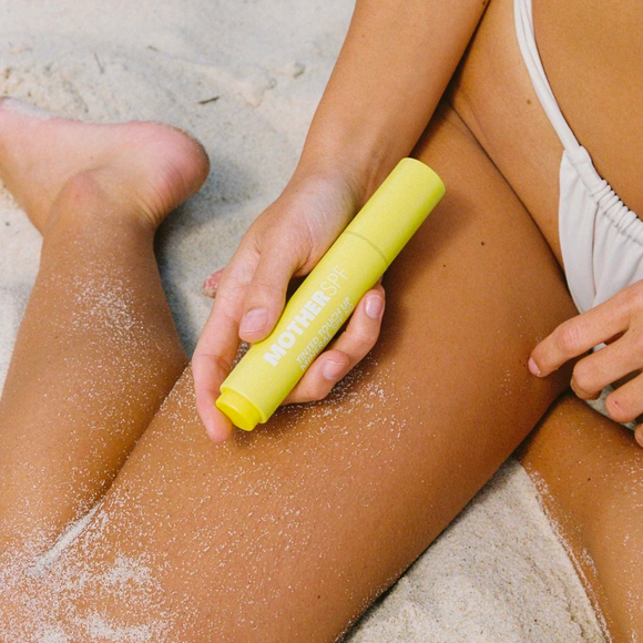 Yellow sunscreen stick.