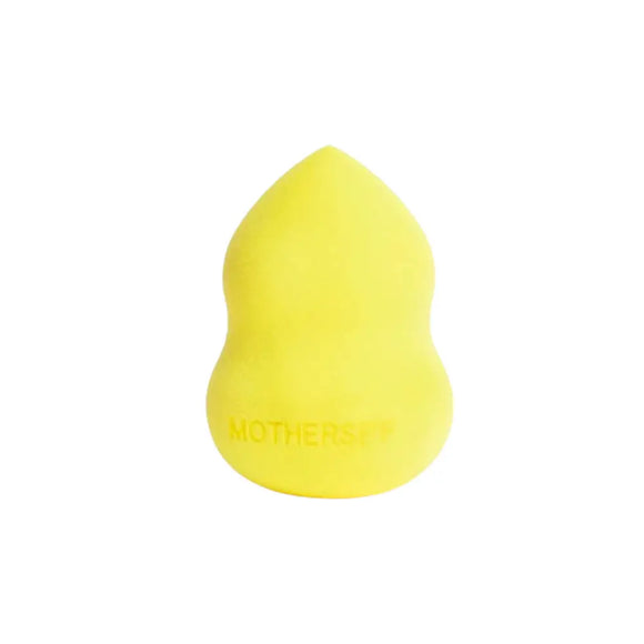 Yellow teardrop-shaped makeup sponge.