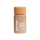 Pearlescent golden skin-toned bottle of Mother SPF sunscreen with blue light protection.