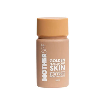 Pearlescent golden skin-toned bottle of Mother SPF sunscreen with blue light protection.