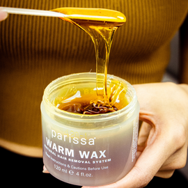 Jar of warm hair removal wax.