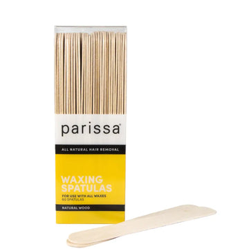 Wooden waxing spatulas in a yellow and black branded box.