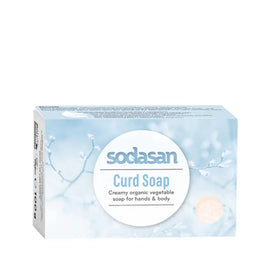 Light blue bar of Sodasan Curd Soap for hands and body.