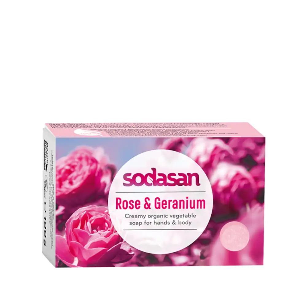 Pink box of Sodasan Rose & Geranium organic soap with floral imagery.