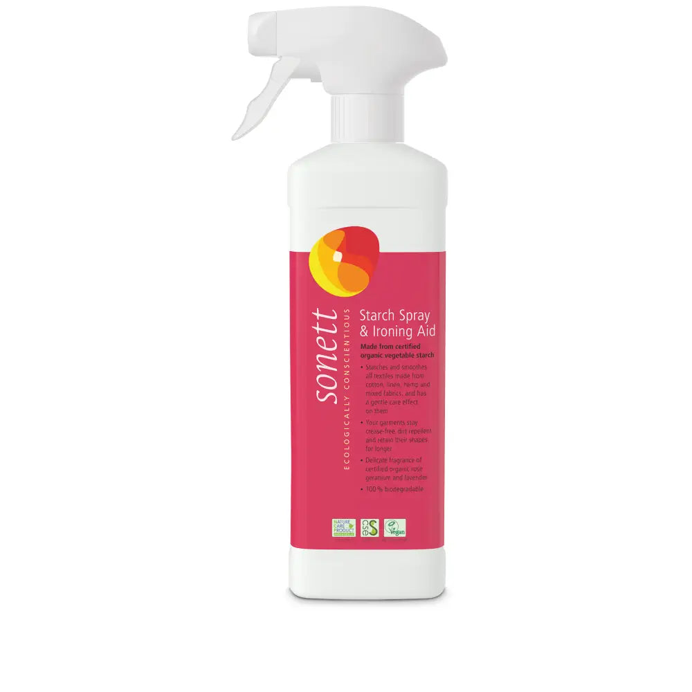 White spray bottle with a pink label and orange circular logo.