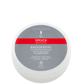 Round container of shaving soap.