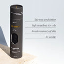 Black cylindrical exfoliating glove container with product benefits listed alongside.