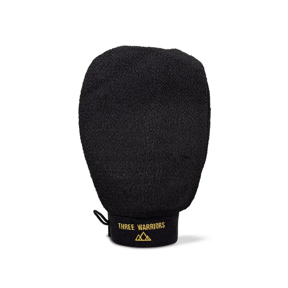 Black tanning glove ’Three Warriors’ text and a logo on its base.