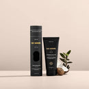 Black skincare product packaging with gold text and minimalist design.