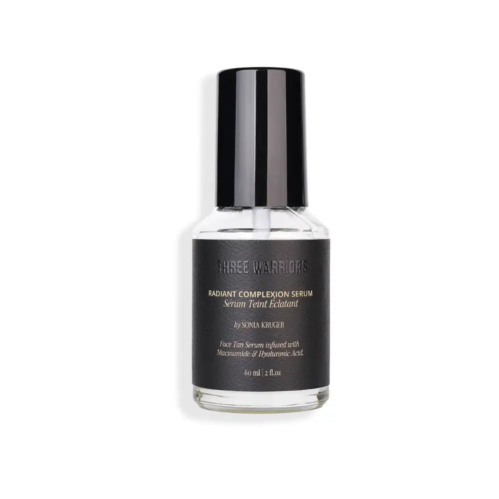 Bottle of Three Warriors instant complexion serum with a black cap.