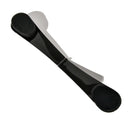 Black self tanning back applicator with rounded ends.