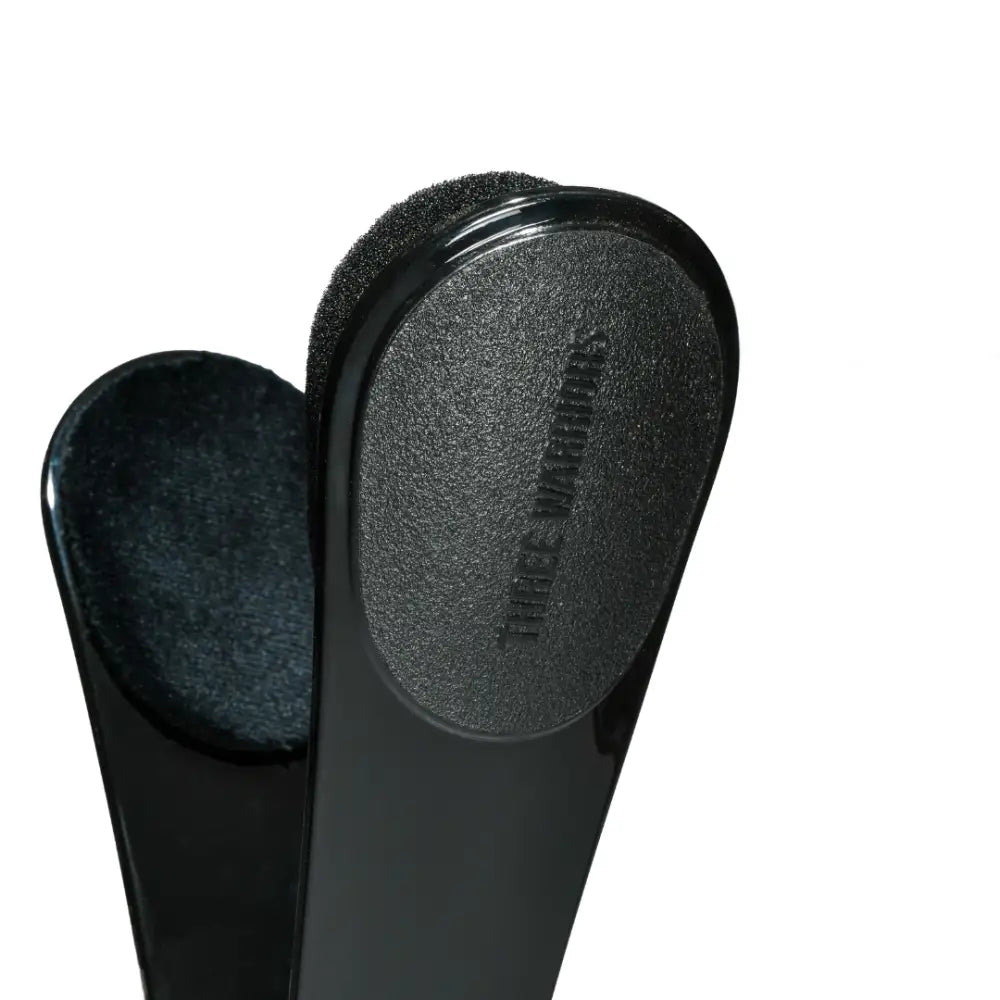 Black plastic earmuffs with foam padding.