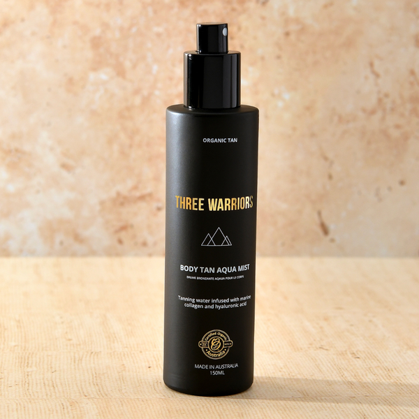 Three warriors body tan aqua mist with tan mist being sprayed out of spray-nozzle.